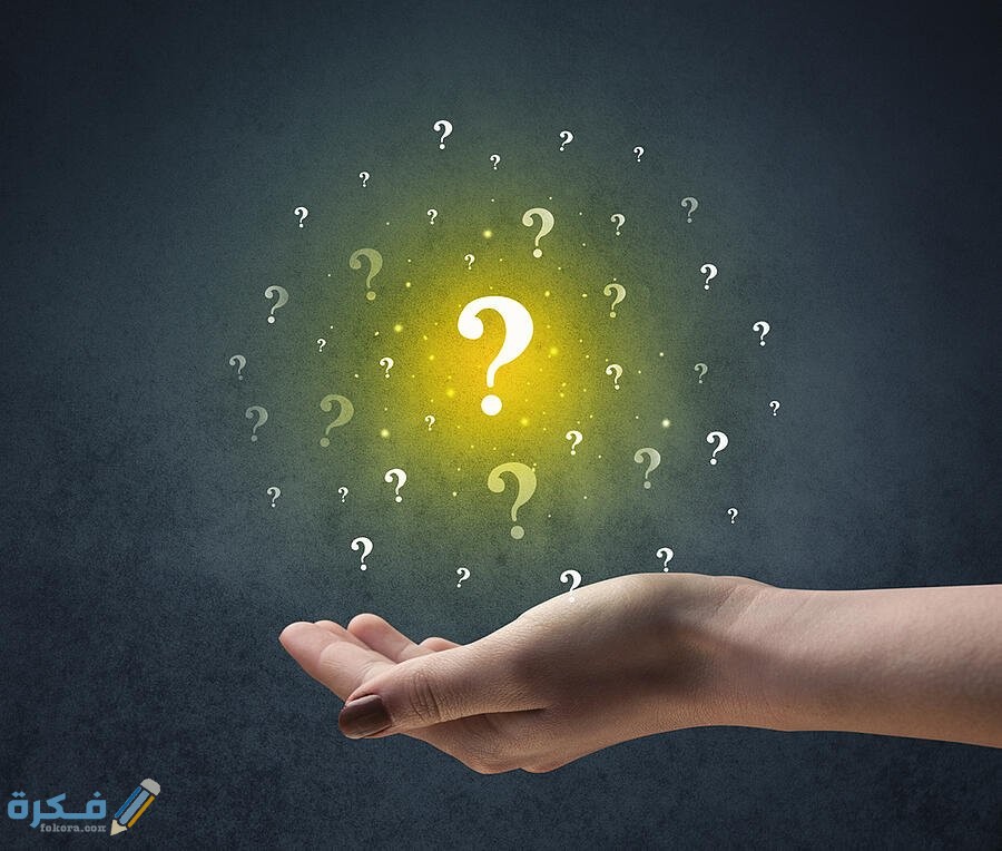 ❌ لم يتم التوليد 1 Yellow question marks hovering over young hand